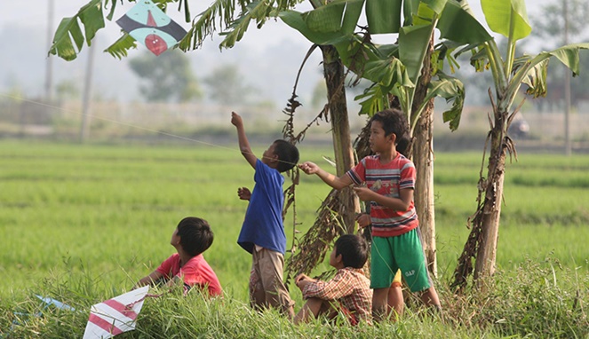 Bermain layangan secara kognitif bagi anak